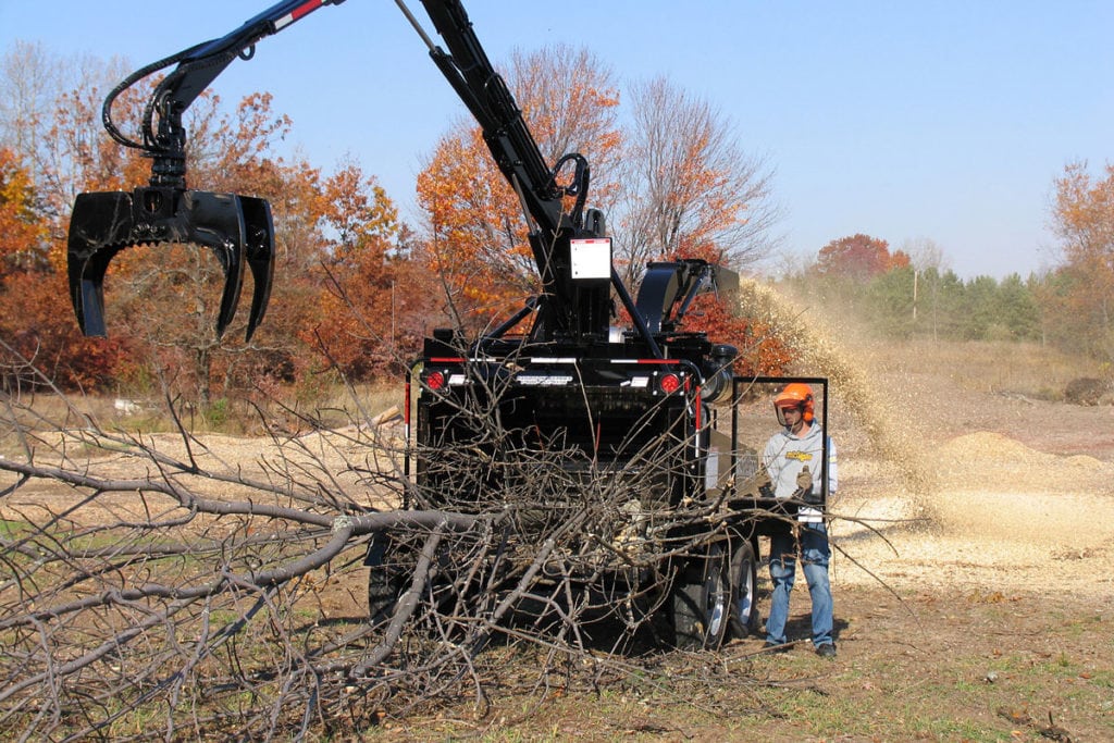 Trees being chipped with Zenith Cutter A Divsion of Fisher Barton industrial knives