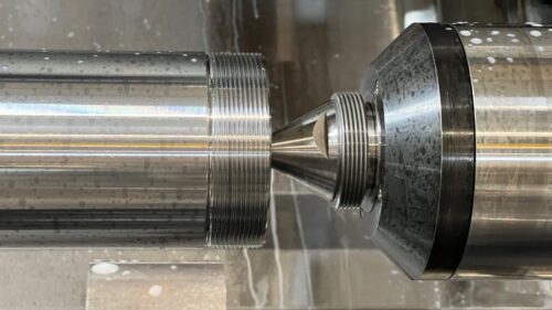 close up shot of machining a part at TCOE